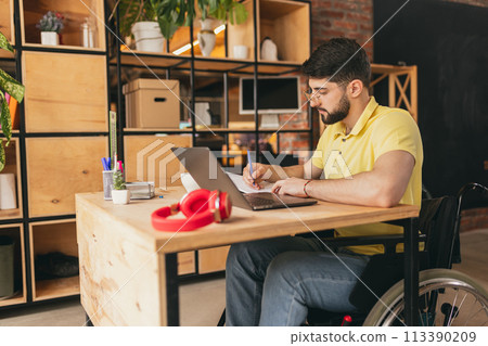 man sitting on wheelchair man sitting on wheelchair 113390209