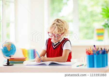 Kids doing homework. Children go back to school. Kids doing homework. Children go back to school. 113391060