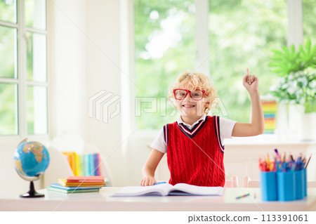 Kids doing homework. Children go back to school. 113391061