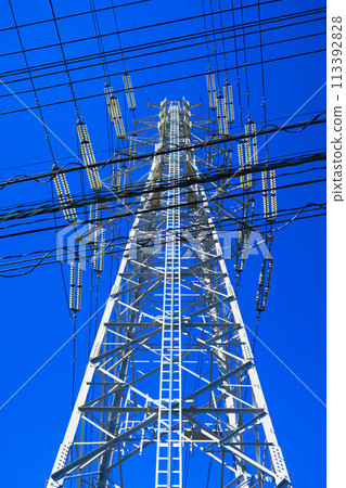 Landscape of steel tower, power line and blue sky 113392828