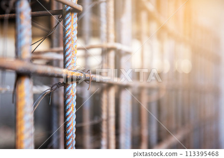 The frame structure made of reinforcement is ready for placing formwork to fill with concrete, close-up and selective soft focus. The frame structure made of reinforcement is ready for placing formwork to fill with concrete, close-up and selective soft focus. 113395468