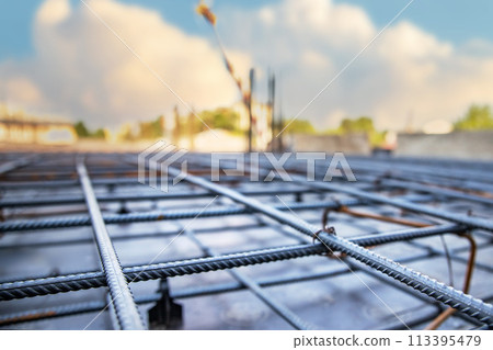 Laying Steel Reinforcement for Industrial Building Foundation: Preparing Floor for Concrete Pouring. 113395479