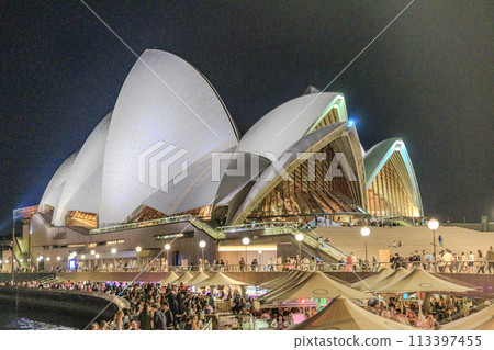 Illuminated Sydney Opera House and crowds (blurred) Illuminated Sydney Opera House and crowds (blurred) 113397455