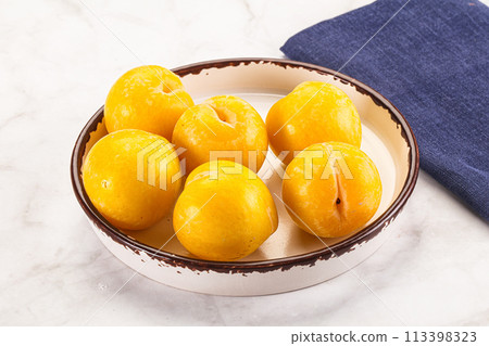 Ripe sweet and juicy Yellow Plums 113398323