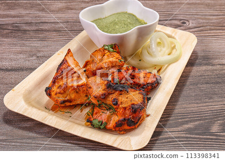 Indian cuisine - tandoori chicken tikka 113398341