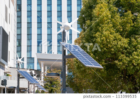 Solar and wind power generation equipment installed throughout the city 113399535