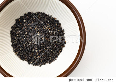 Mortar and black sesame seeds Mortar and black sesame seeds 113399567