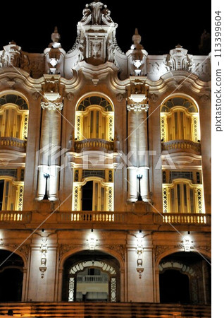 Cuba, Central Park streetscape, Garcia Lorca Theatre, illuminated 113399604