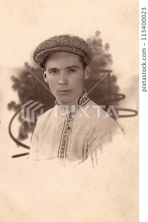 Vintage photo of a young man of twenty years old. Photo from 1929. USSR, Rostov. Vintage photo of a young man of twenty years old. Photo from 1929. USSR, Rostov. 113400023