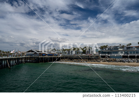 A coastline lined with resort hotels and resort condominiums A coastline lined with resort hotels and resort condominiums 113400215