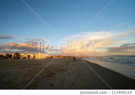 Ferris wheel dyed at sunset Ferris wheel dyed at sunset 113400228