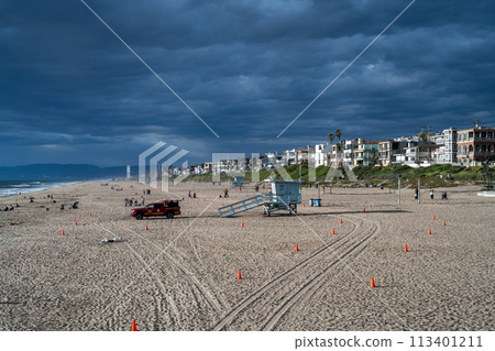 A coastline lined with resort hotels and resort condominiums A coastline lined with resort hotels and resort condominiums 113401211