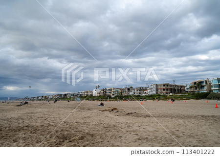 A coastline lined with resort hotels and resort condominiums A coastline lined with resort hotels and resort condominiums 113401222