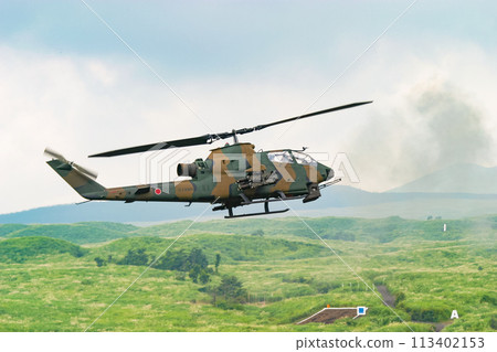 Ground Self-Defense Force anti-tank helicopter AH-1S in flight 113402153