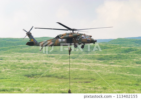 Japan Ground Self-Defense Force helicopter UH-60JA participating in a training demonstration Japan Ground Self-Defense Force helicopter UH-60JA participating in a training demonstration 113402155