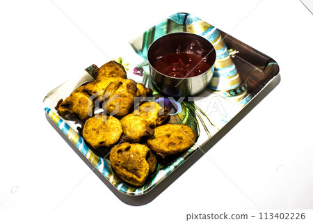A picture of onion Pakora with selective focus A picture of onion Pakora with selective focus 113402226