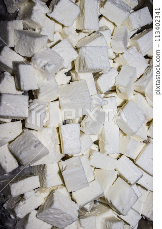 A picture of paneer slices with selective focus 113402341