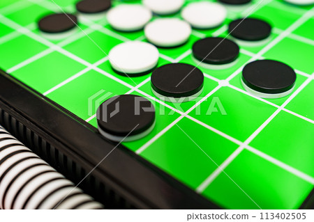 Othello is a form of the British game Reversi. [Image of the Othello game] 113402505