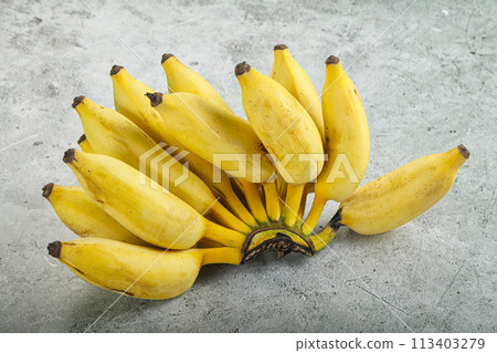 Small sweet ripe banana heap 113403279
