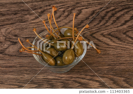 Caper berries in the bowl 113403365