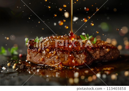 Grilled beef steak in Teriyaki sauce, delicious juicy beef steak with spices and sauce close-up on a board on a dark background 113403858