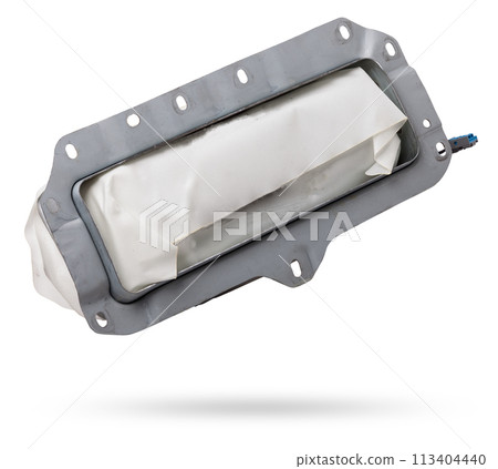 Spare part and interior element from a car passenger airbag in the dashboard on a white isolated background. Auto service industry. Spare part and interior element from a car passenger airbag in the dashboard on a white isolated background. Auto service industry. 113404440