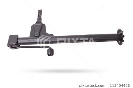 Black metal jack for replacing a car wheel on a white isolated background in a car service. Equipment in the trunk and in the garage. Black metal jack for replacing a car wheel on a white isolated background in a car service. Equipment in the trunk and in the garage. 113404466
