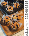 Homemade blueberry muffins made with fresh blueberries from the garden 113404816