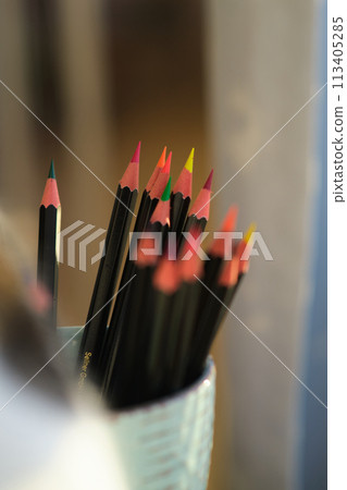 Colored pencils in a mug Colored pencils in a mug 113405285