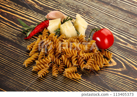 Raw whole grain pasta fusilli Raw whole grain pasta fusilli 113405373