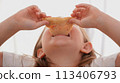 A girl eats pizza, Baby food, Fast food. High quality photo 113406793