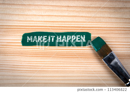 Make It Happen. Green color with paint brush on wood texture background 113406822