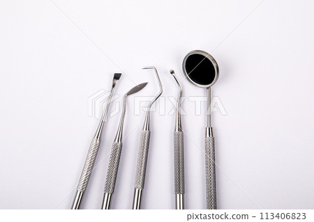 Set of dental instruments on a white background. Health and hygiene 113406823
