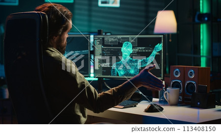 Man inserting classified disk into PC containing sentient AI waving hand, greeting creator. Scientist placing confidential cartridge in computer, awakening self aware artificial intelligence, camera A 113408150