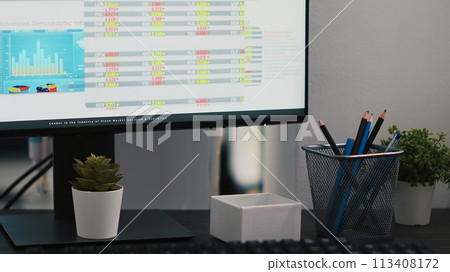 Market index listings values going up and down on computer monitor, price volatility concept. Broker trading economic analytics figures on PC screen in workspace, close up shot 113408172