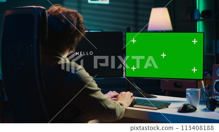 Programmer updating artificial intelligence algorithm using green screen PC, making it become sentient. IT specialist programming self aware AI with mockup computer, camera A Programmer updating artificial intelligence algorithm using green screen PC, making it become sentient. IT specialist programming self aware AI with mockup computer, camera A 113408188