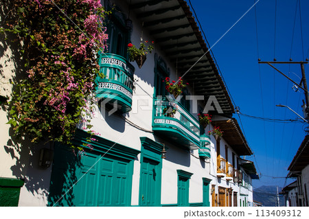Beautiful facade of the houses at the historical downtown of the heritage town of Salamina located at the Caldas department in Colombia. 113409312