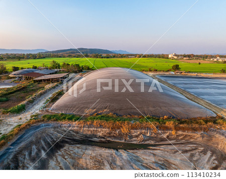 Covered lagoon digester for biogas production from poultry farm. Covered lagoon digester for biogas production from poultry farm. 113410234