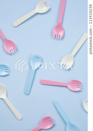 Set of kid forks lying on blue background. Set of kid forks lying on blue background. 113410256