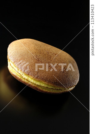 Dorayaki photographed against a black background Dorayaki photographed against a black background 113410423