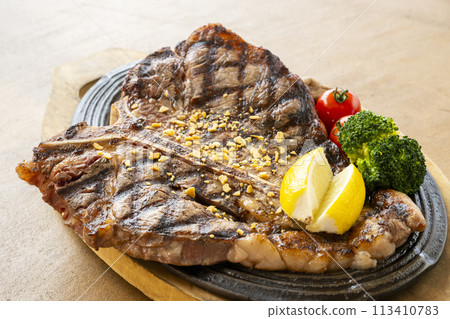 Thick T-bone steak Thick T-bone steak 113410783