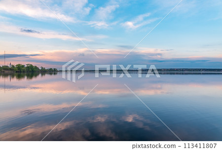 Blue lake with cloudy sky, natural background 113411807