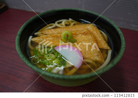 Japanese-style udon with large pieces of tofu Japanese-style udon with large pieces of tofu 113412815