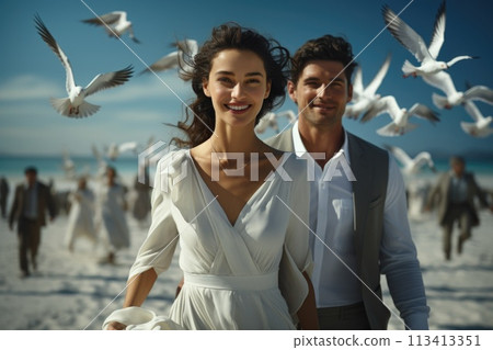 Capturing love on the beach: a beautiful couple shares intimate moments by the sea, surrounded by seagulls, enjoying the serenity, romance, and breathtaking scenery of their coastal paradise getaway. 113413351