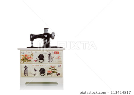 jewelry box with decorative sewing machine on a white background 113414817