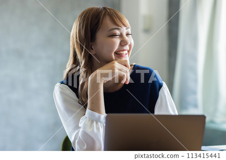Woman working with smile 113415441