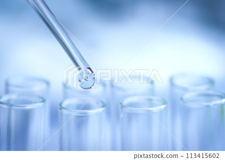 The researchers tested antibiotics in a glass tube in a hospital lab. The researchers tested antibiotics in a glass tube in a hospital lab. 113415602