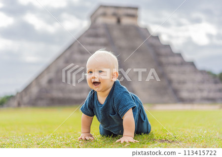 Baby traveler, tourists observing the old pyramid and temple of the castle of the Mayan architecture known as Chichen Itza these are the ruins of this ancient pre-columbian civilization and part of Baby traveler, tourists observing the old pyramid and temple of the castle of the Mayan architecture known as Chichen Itza these are the ruins of this ancient pre-columbian civilization and part of 113415722