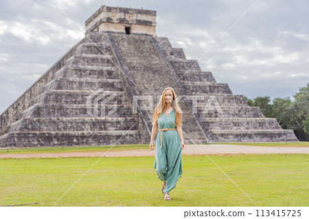 Beautiful tourist woman observing the old pyramid and temple of the castle of the Mayan architecture known as Chichen Itza these are the ruins of this ancient pre-columbian civilization and part of Beautiful tourist woman observing the old pyramid and temple of the castle of the Mayan architecture known as Chichen Itza these are the ruins of this ancient pre-columbian civilization and part of 113415725