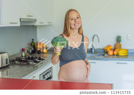 Embracing a nutrient-rich choice, a pregnant woman eagerly prepares to enjoy a wholesome serving of broccoli, prioritizing healthy and nourishing options during her pregnancy Embracing a nutrient-rich choice, a pregnant woman eagerly prepares to enjoy a wholesome serving of broccoli, prioritizing healthy and nourishing options during her pregnancy 113415735